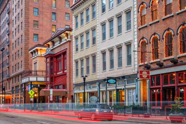 Photo of colorful pubs and restaurants and old historic facades on Walnut Street in downtown Cincinnati, Ohio, USA