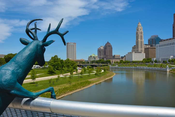 A metal stag statue on a bridge over the Scioto River in Columbus, Ohio.