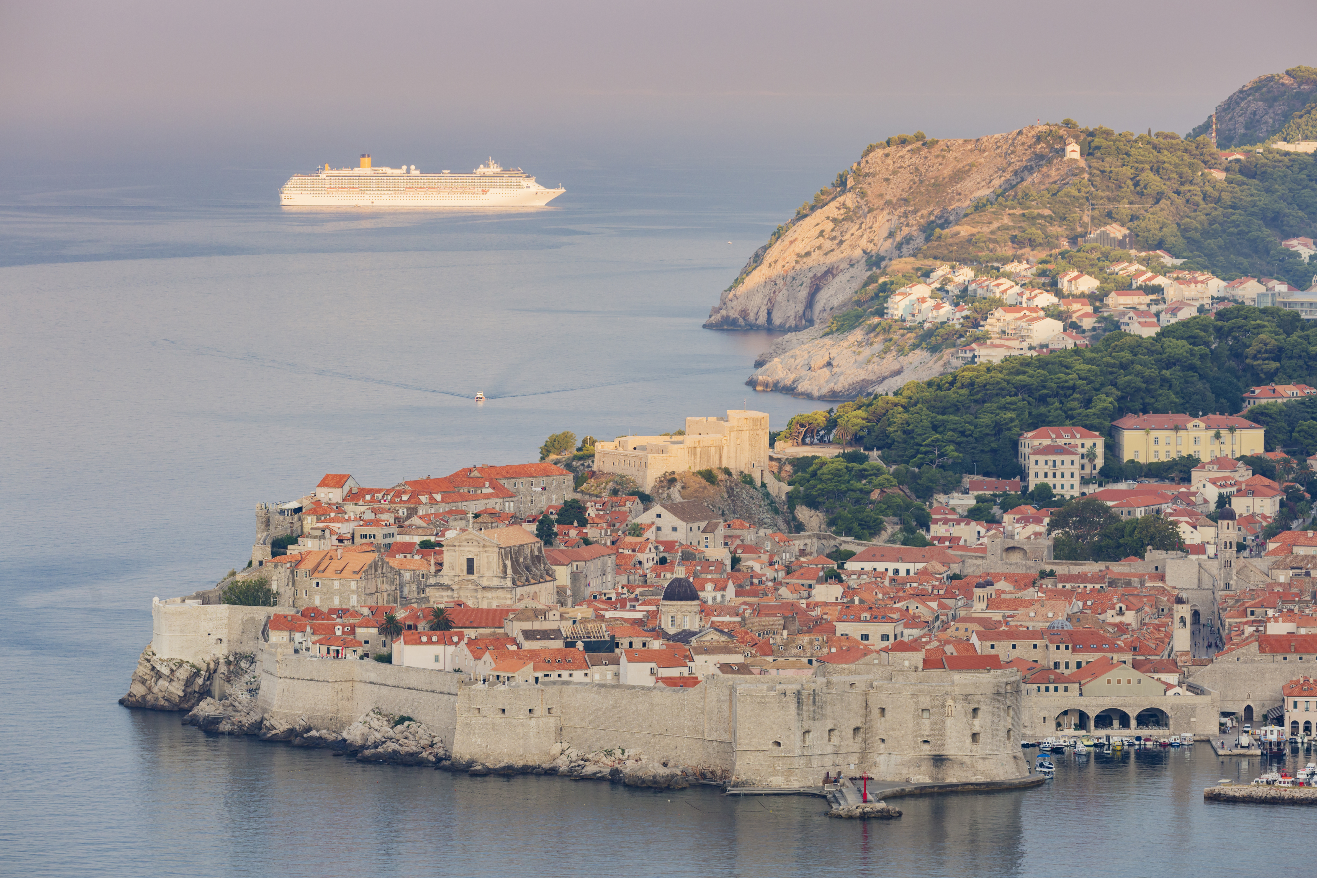 A cruis ship passes in the distance of Dubrovnik's Old Town