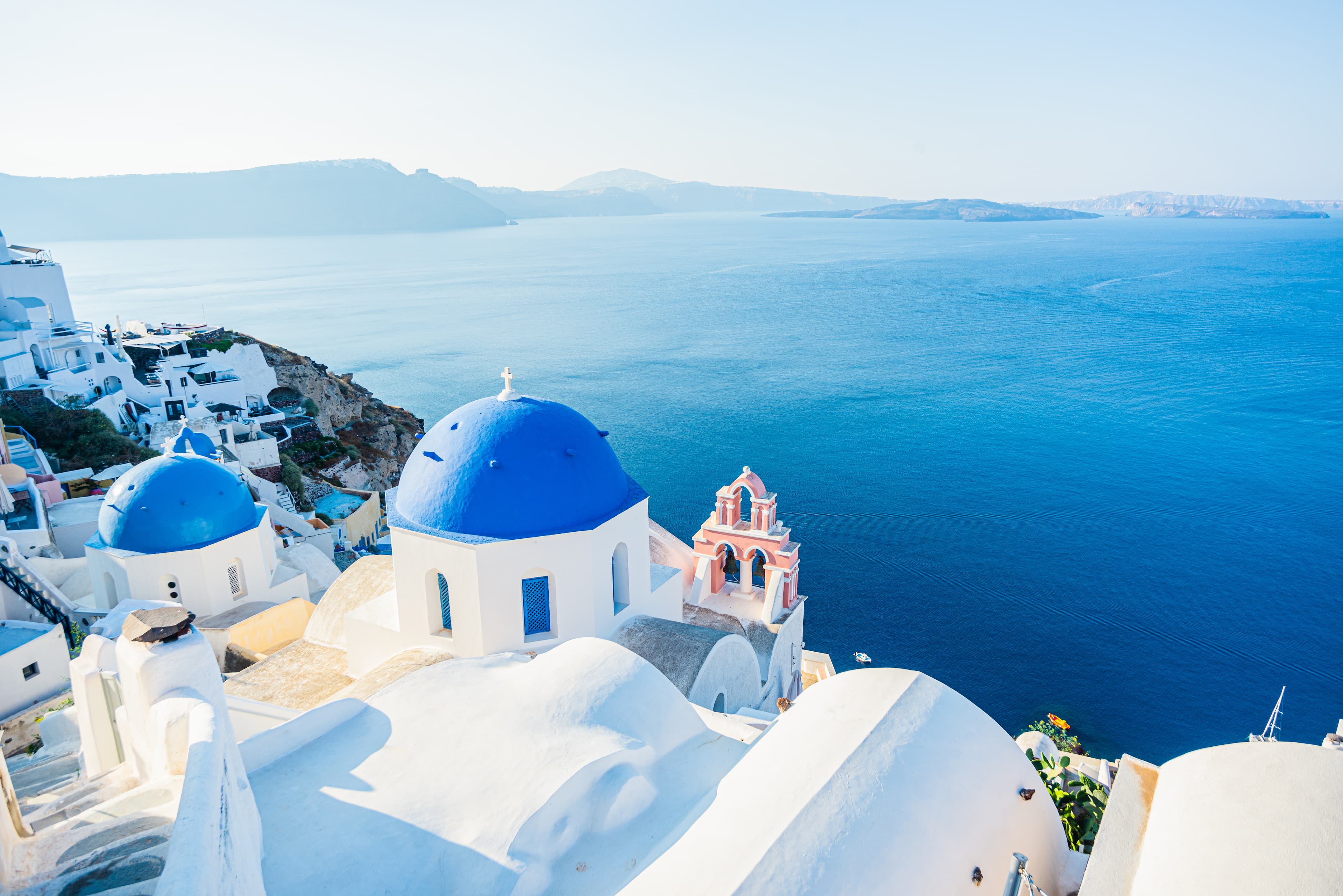 Blue Waters And Domes Of Santorini
