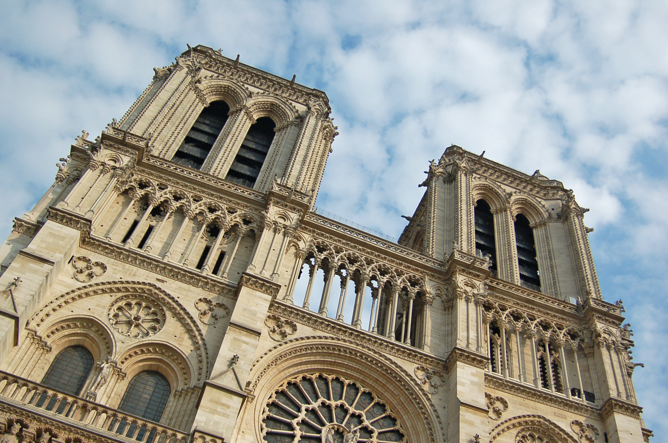 A view of the main structure and two front towers of Notre-Dame de Paris.