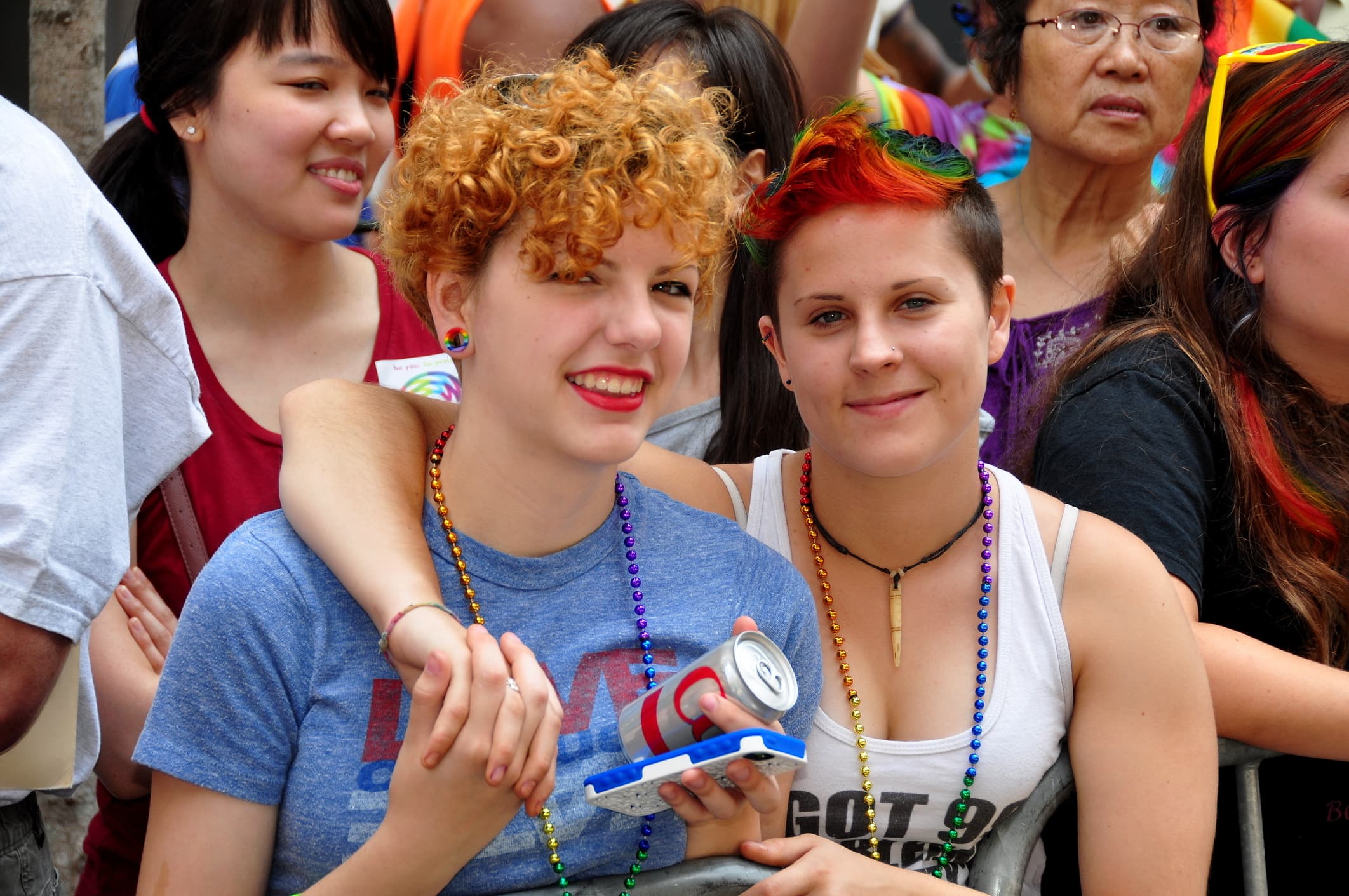 NYC Pride Parade, two women watch