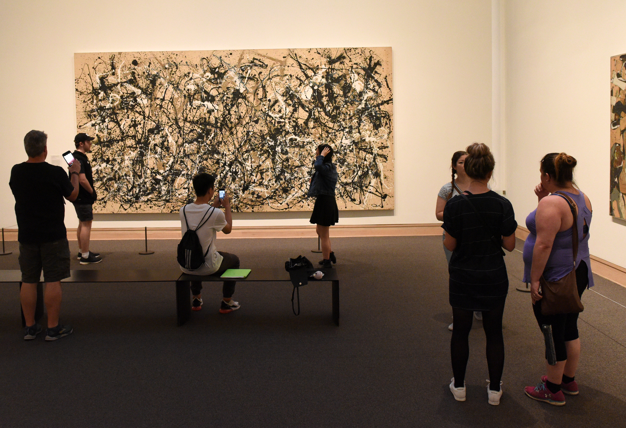 Children looking at a Jackson Pollock painting at the Met Museum, NYC