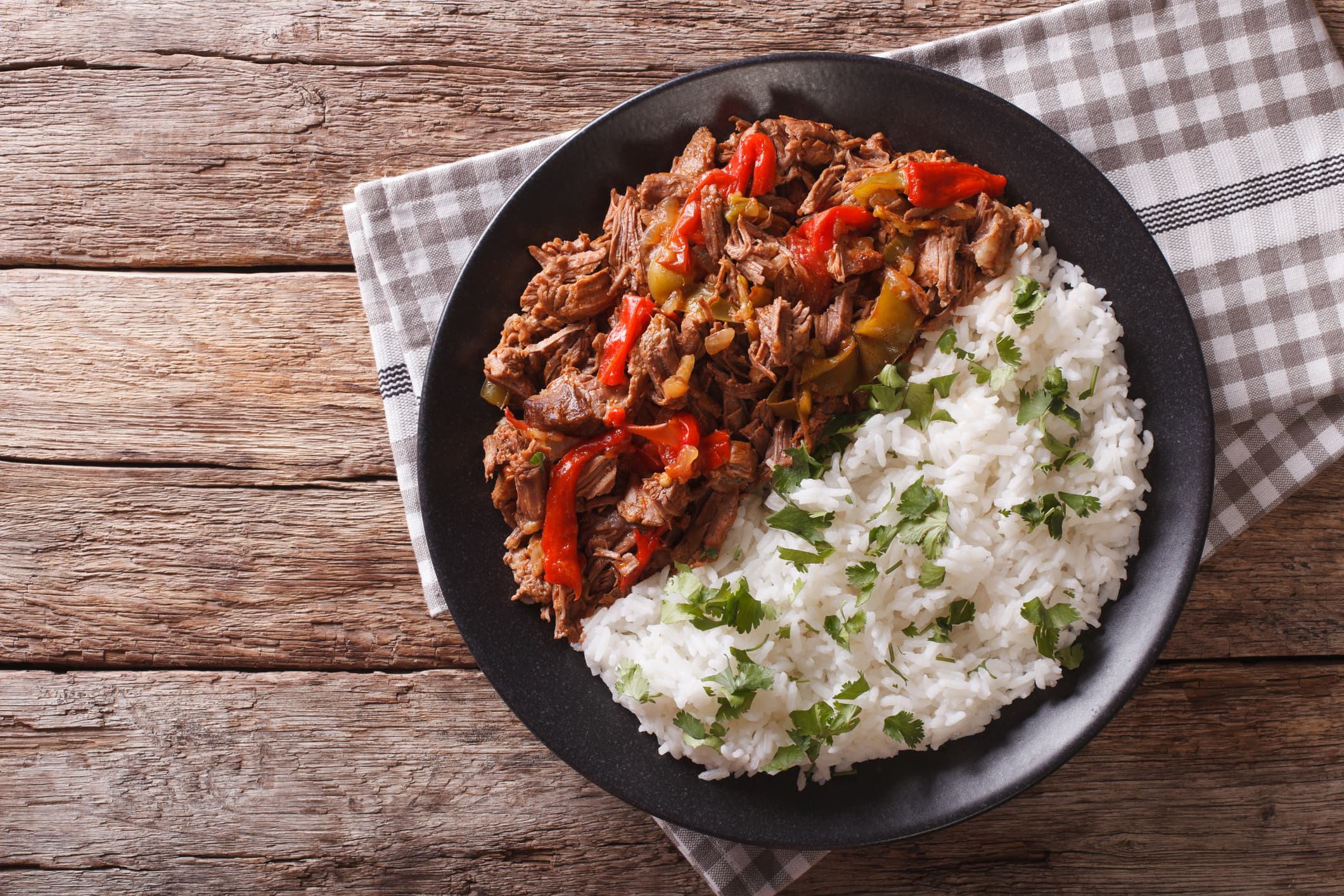 An overhead view of a plate of the Cuban dish Ropa Vieja
